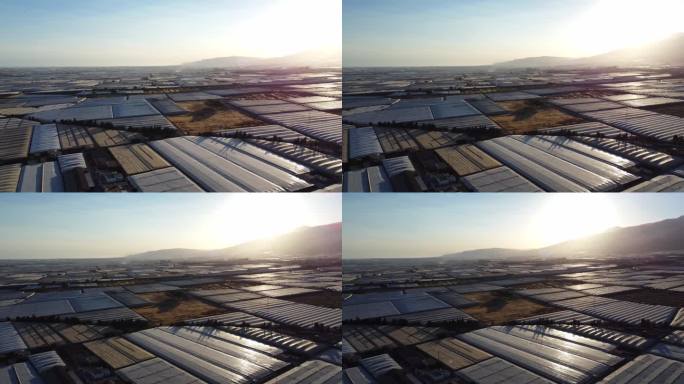 El ejedo绿屋的全景无人机拍摄，太阳落山后.高质量的镜头.