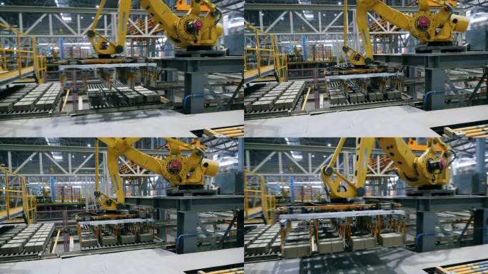 机械臂在现代工业工厂运输陶瓷产品.