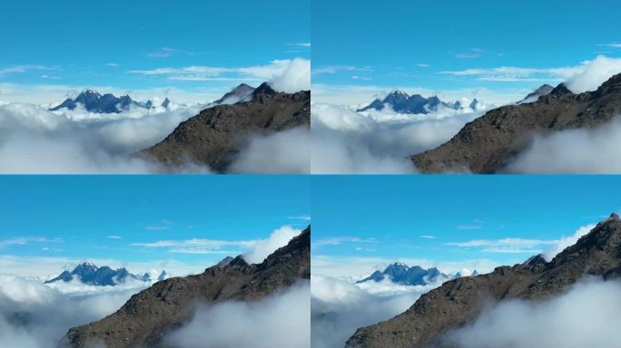 航拍云雾中的四川阿坝巴朗山垭口雪山群峰