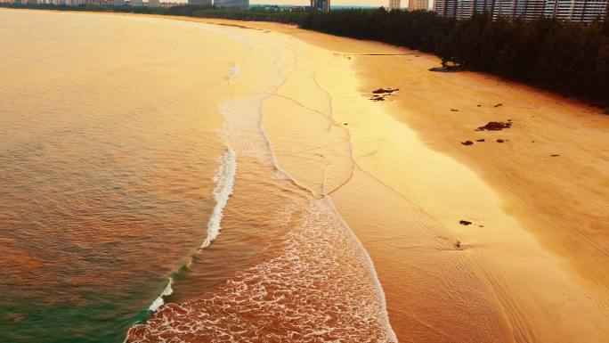 海边沙滩金色日落夕阳