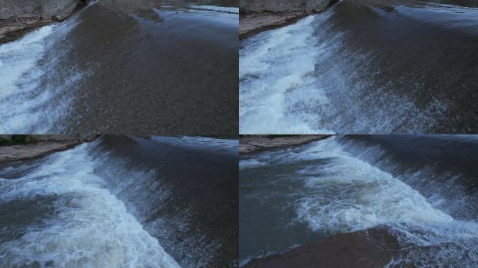 航拍水利工程拦河渠坝形成小瀑布