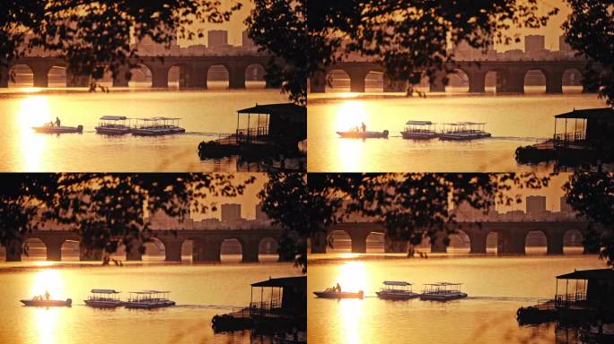 金色湖面波光粼粼黄昏渔船实拍