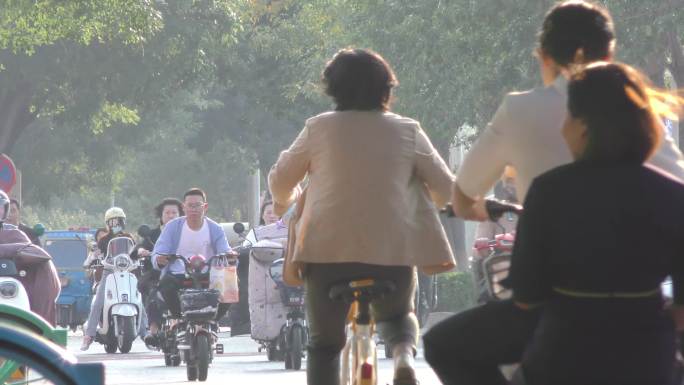 骑车人文市井快节奏都市晚霞忙忙碌碌夕阳红