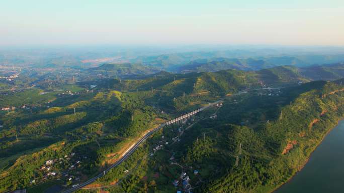 航拍山林中高速公路穿过