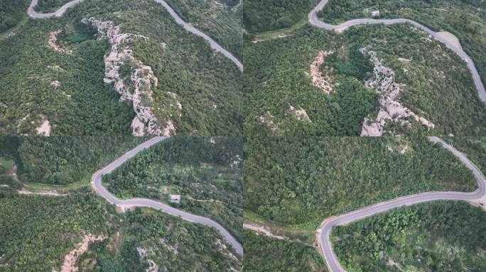 航拍俯瞰威海里口山元宝山的山林岩石道路