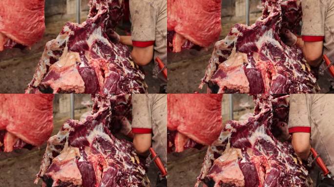 牛羊市场牦牛肉屠夫解剖牛刀具切割卖牛肉