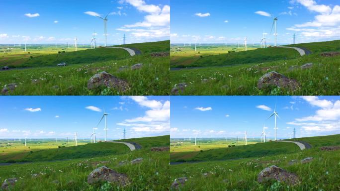 夏季蓝天下张北草原上的白色风力发电机