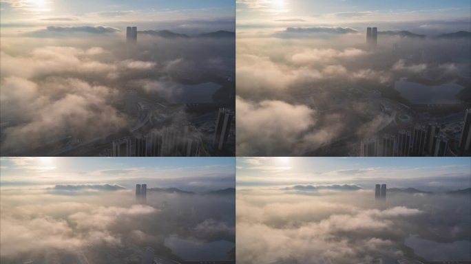 航拍5.4K深圳龙华星河双子塔日出平流雾