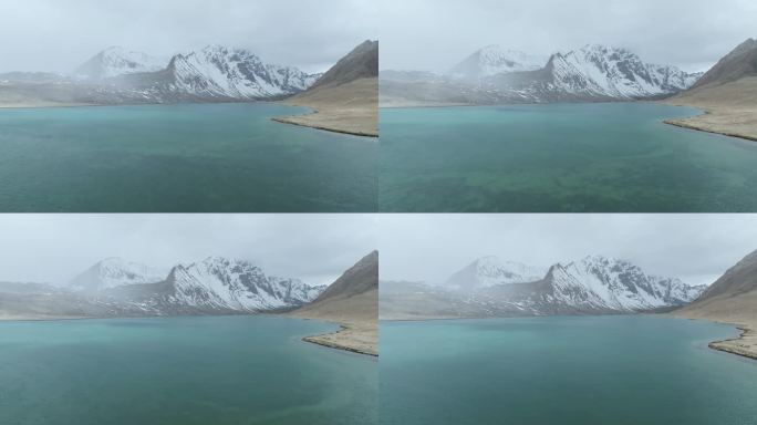 航拍西藏日喀则定结宗措湖和阿玛直米雪山