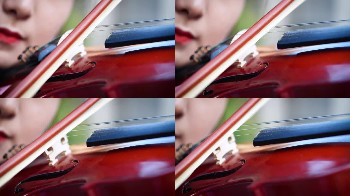 4K女生拉小提琴演奏特写画面