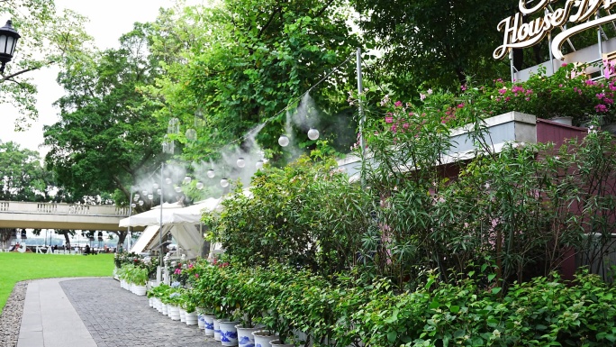 4K实拍秋天羊城广州沙面某餐厅外花园喷雾