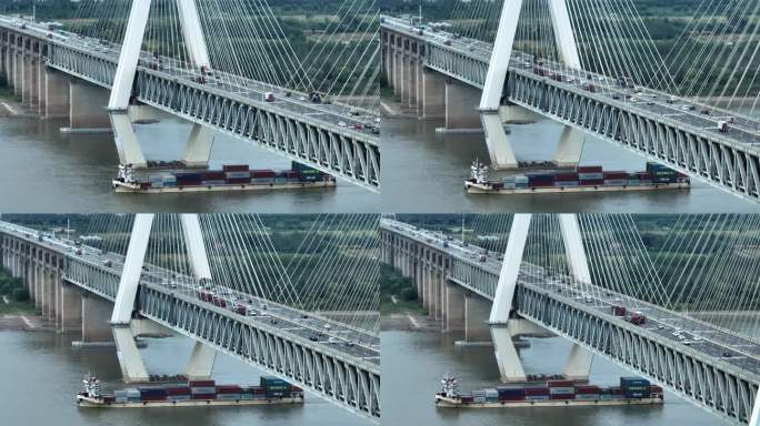 航拍长江货轮穿过大桥视频素材