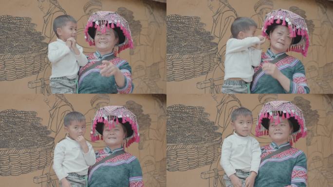 乡村振兴云南苗族妇女小孩微笑升格视频
