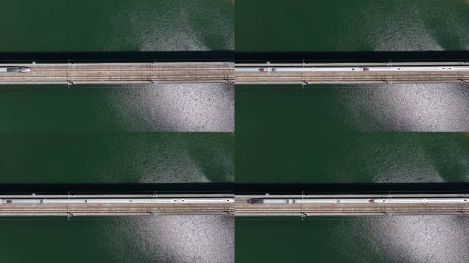 俯拍桂林高铁行驶的动车 碧绿的湖泊