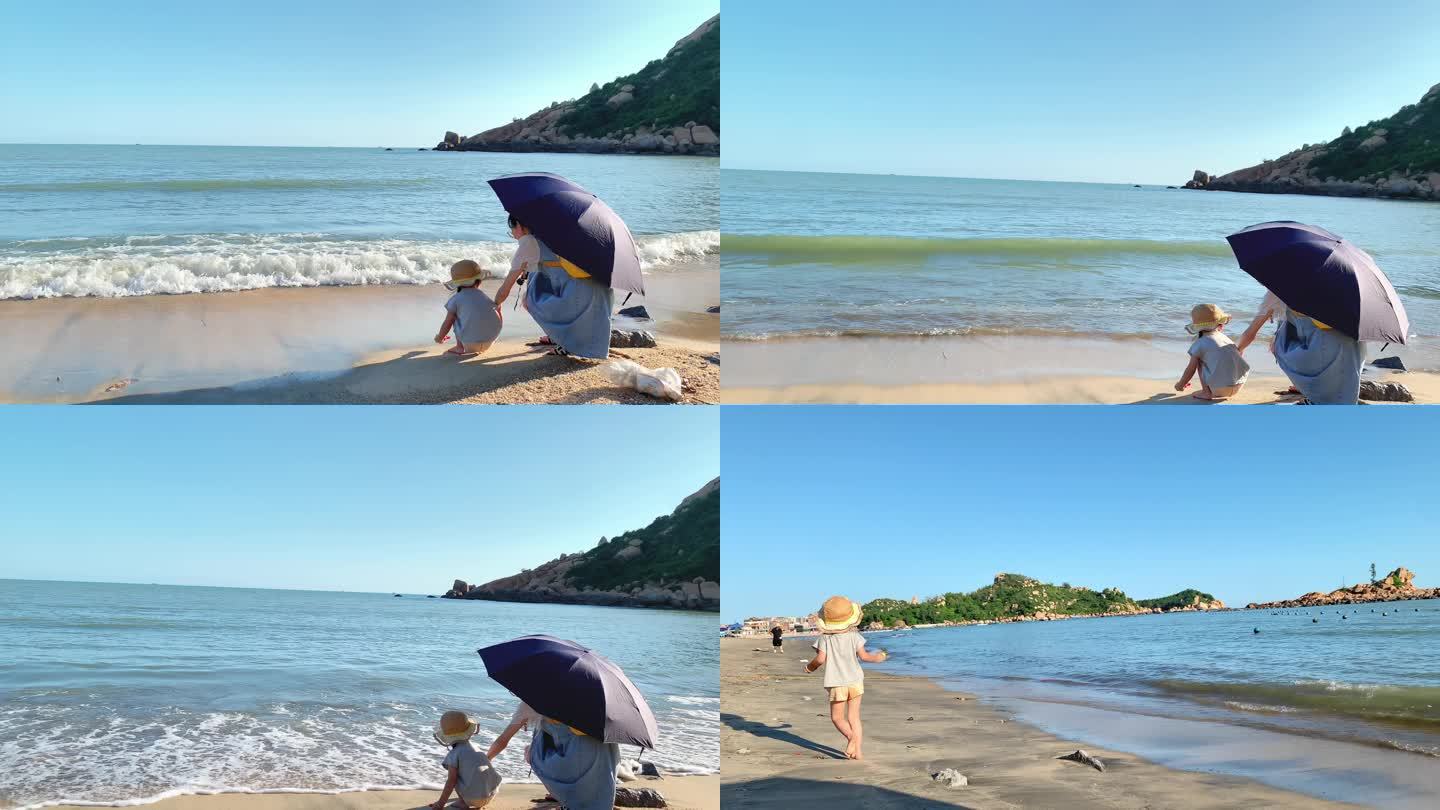 小孩在海边玩耍