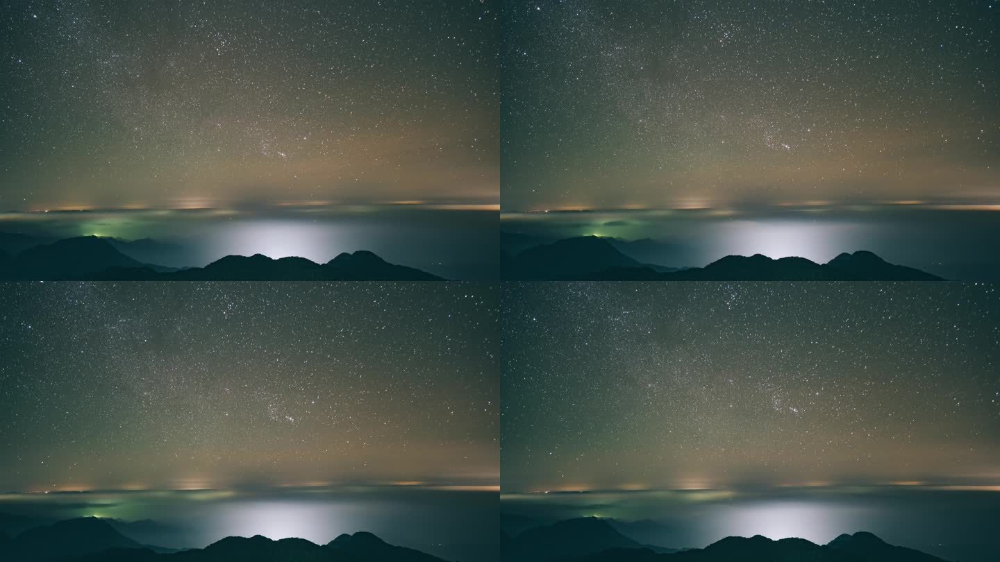 星空和山顶流动的云雾延时摄影