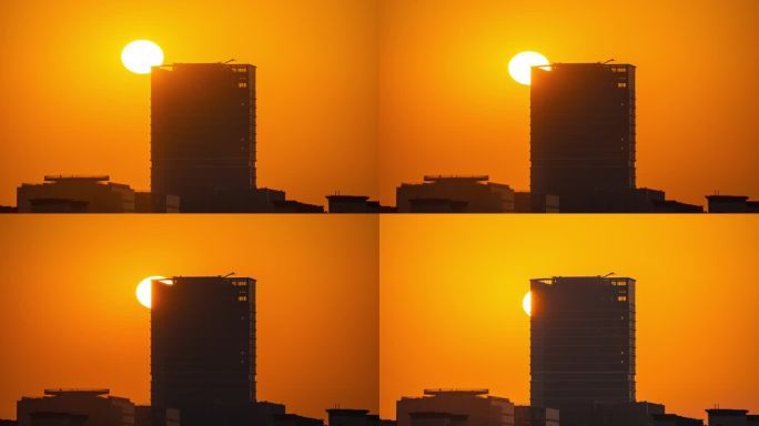 日落太阳穿过城市建筑一角