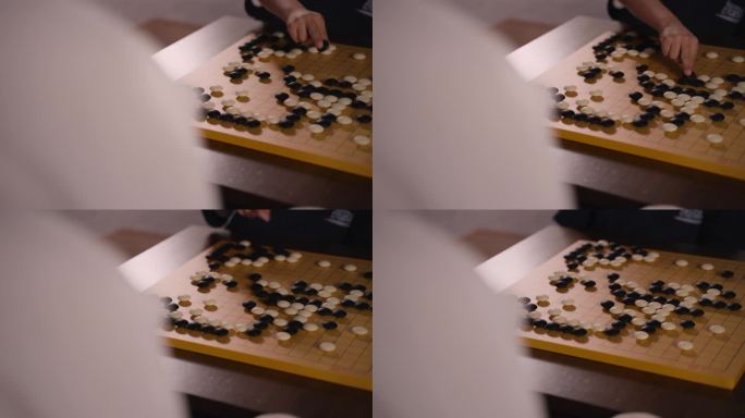 围棋棋子落子大师创意动作特写