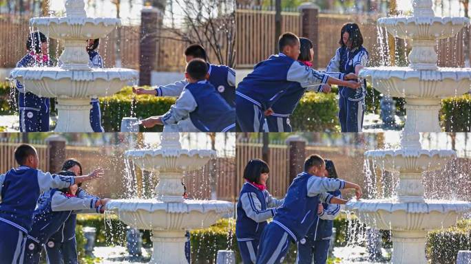 升格：学生课间休息在校园喷泉玩水嬉笑打闹