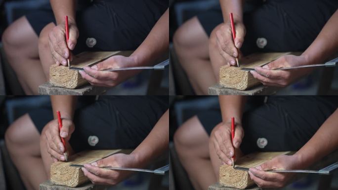 传统木匠师傅在木头上划线做工具实拍原素材