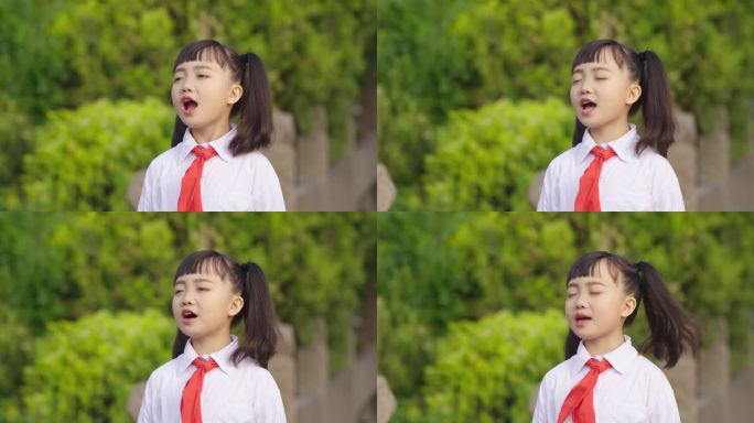 国庆节唱红歌的小学生祝福祖国