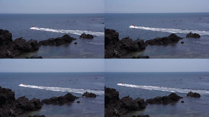 济州岛游艇海边黑礁石海浪牛岛