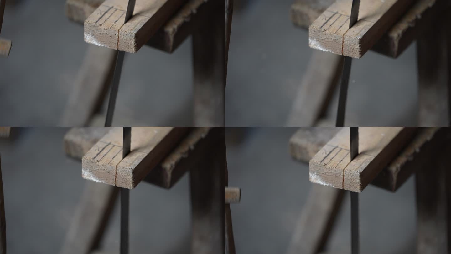 传统木匠师傅用锯子在木头上开槽实拍原素材