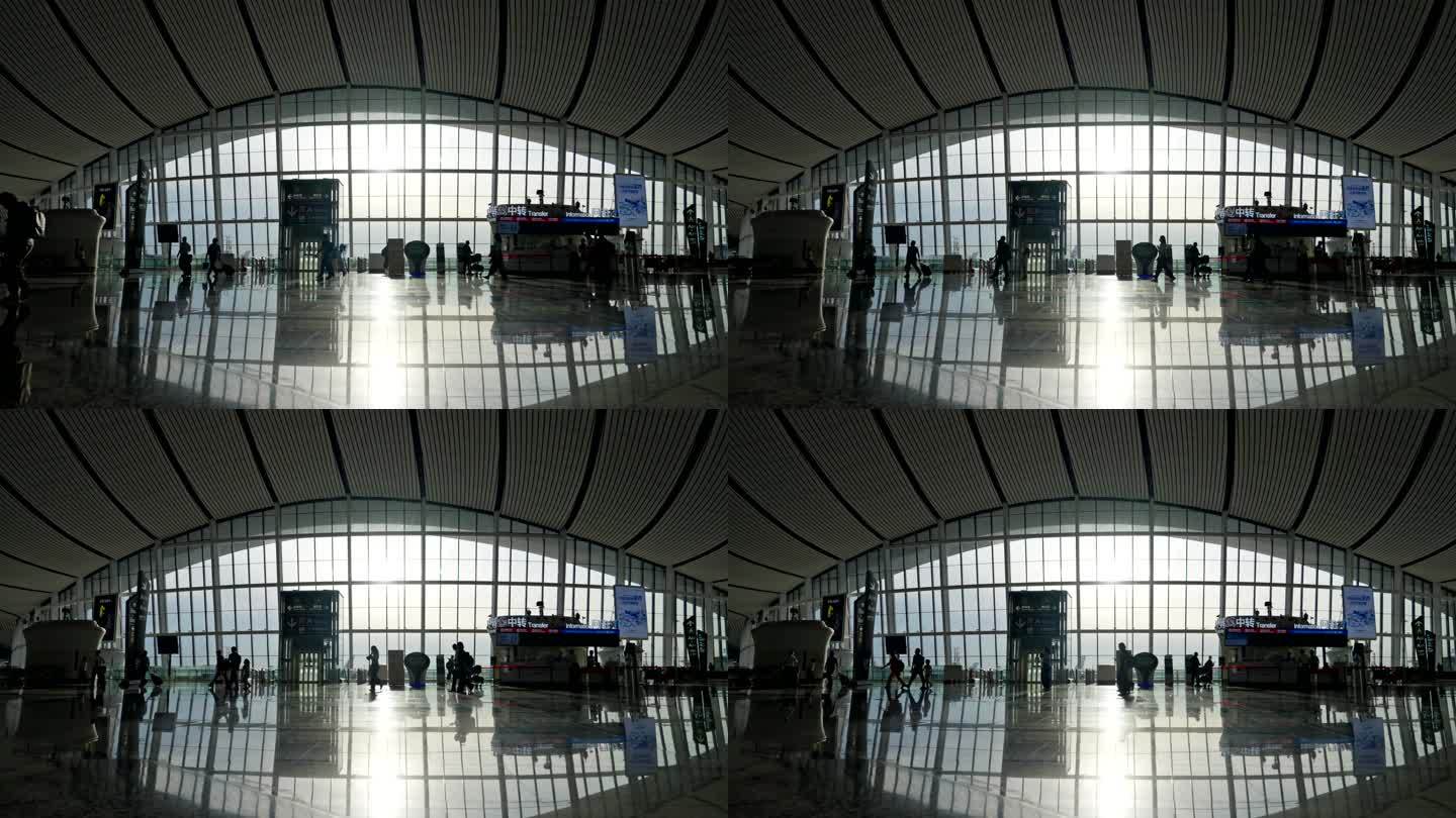 机场内的旅客着行李箱来来往往行走剪影