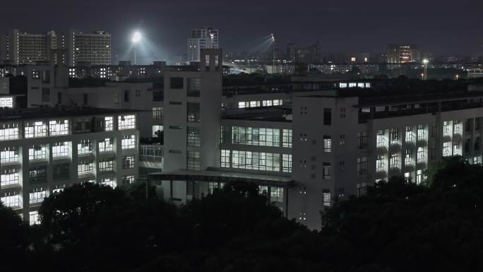 航拍上海东华大学松江校区建筑夜景