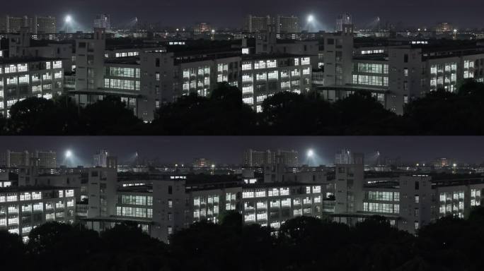 航拍上海东华大学松江校区建筑夜景