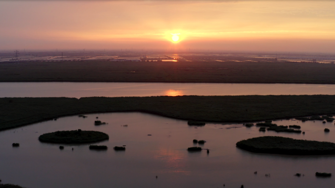 唯美河流湿地落日夕阳晚霞水面林洪河湿地