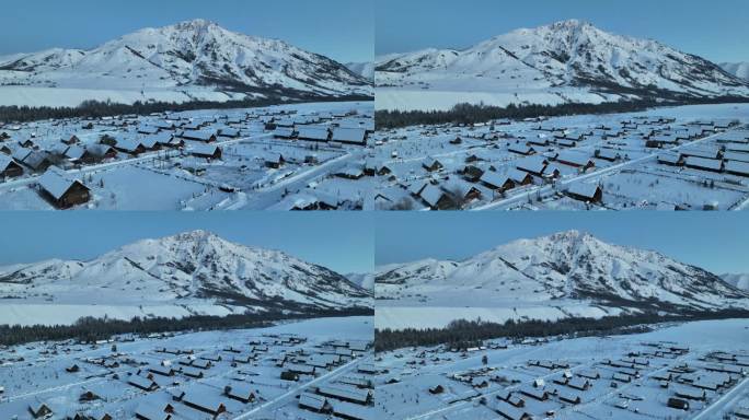 冬季大雪覆盖的新疆阿勒泰禾木村黎明风光