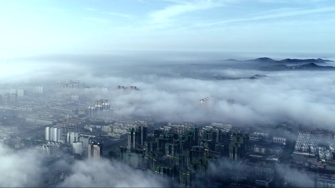 无人机航拍沂南县城区的云海城市风光平流雾