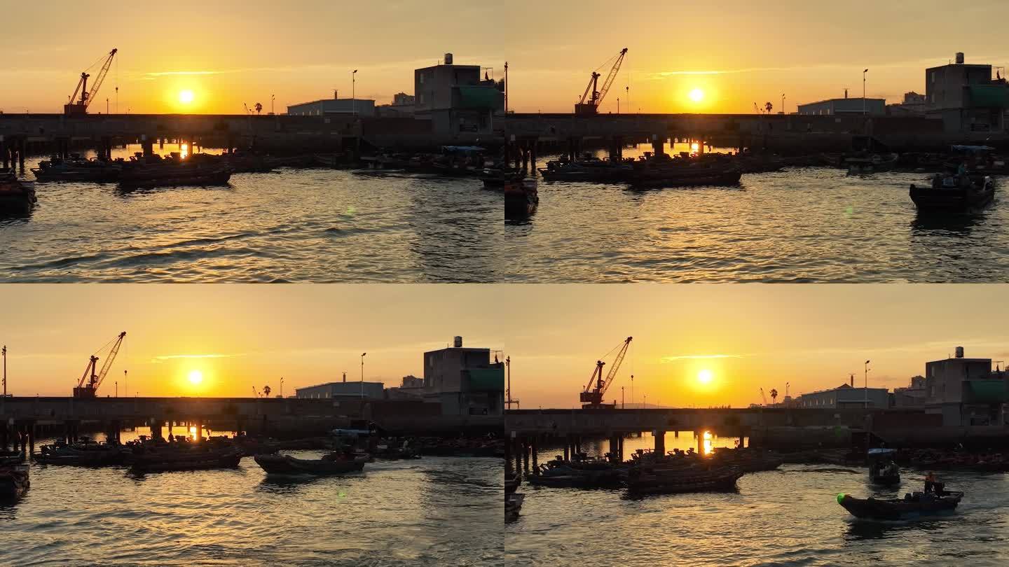 清晨朝阳码头渔民渔船出海