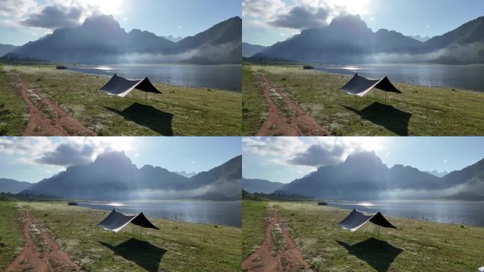 湖边的旅游露营帐篷天幕