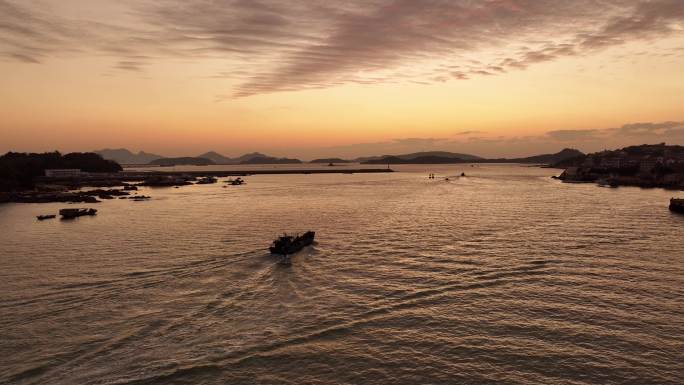 航拍清晨朝阳码头渔民渔船出海
