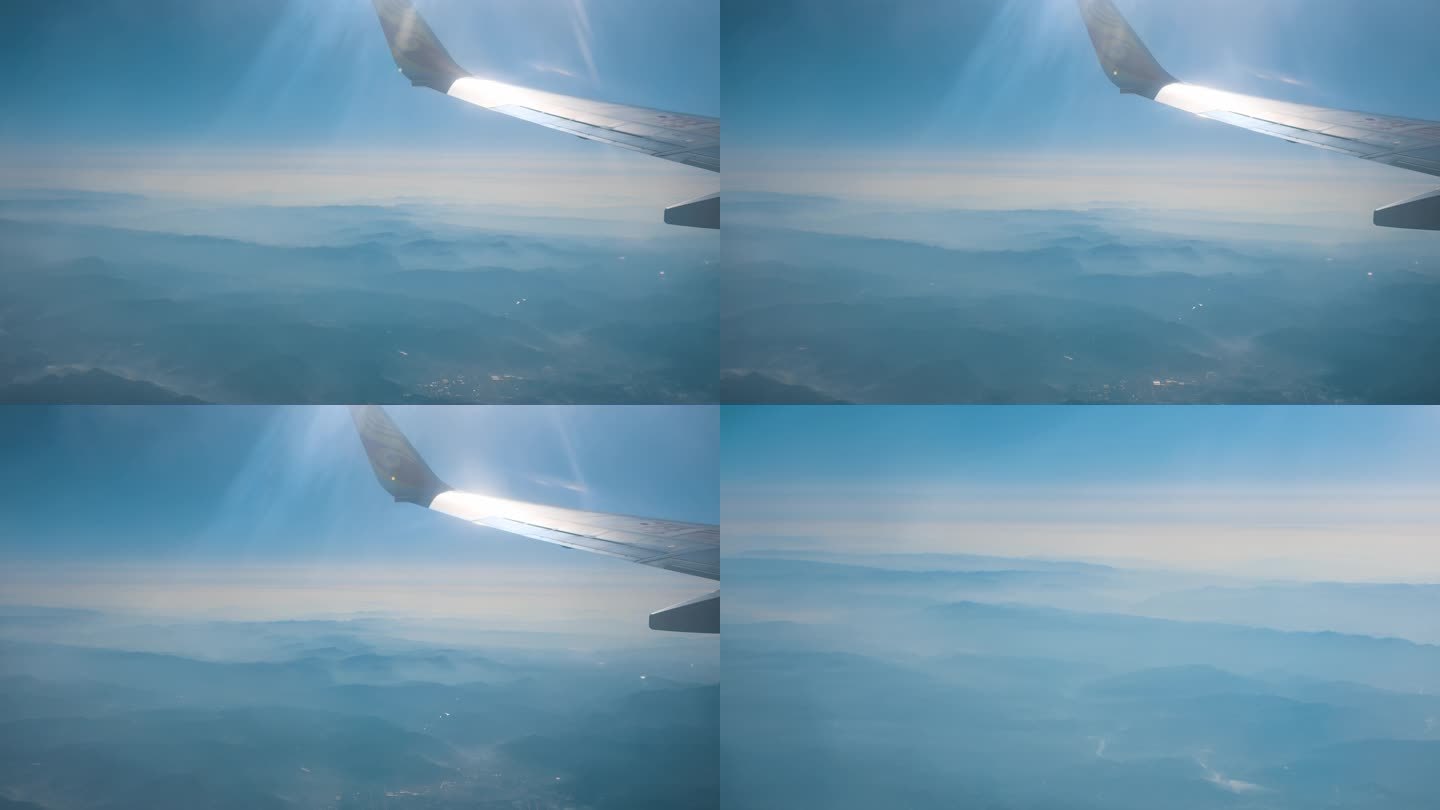 飞机窗外群山连绵