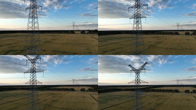 夕阳下高压电线铁塔航拍