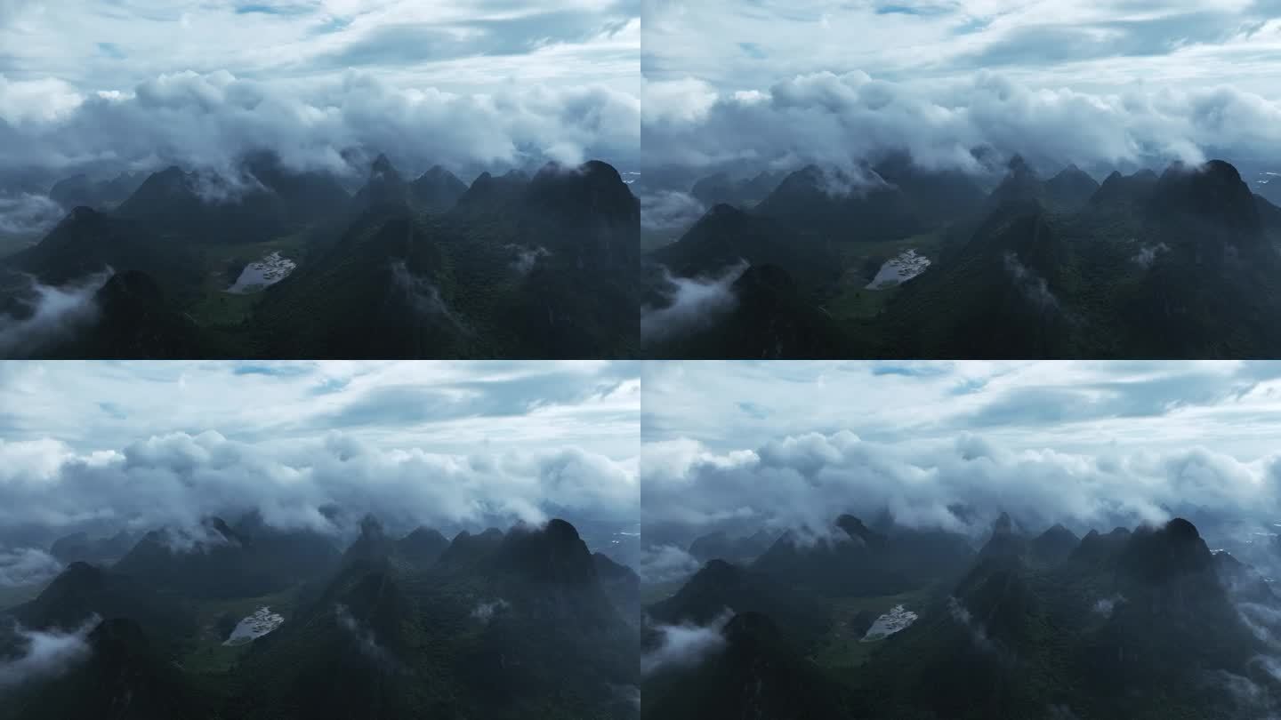 航拍日出下桂林云雾缭绕的山和乡村的田地