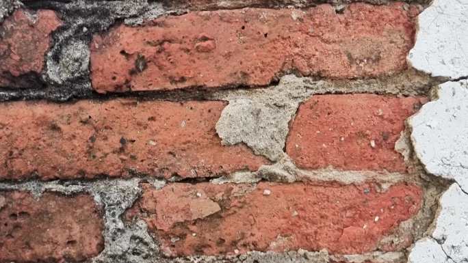 老红砖墙年代感水泥砖锈迹斑斑风蚀的红砖墙