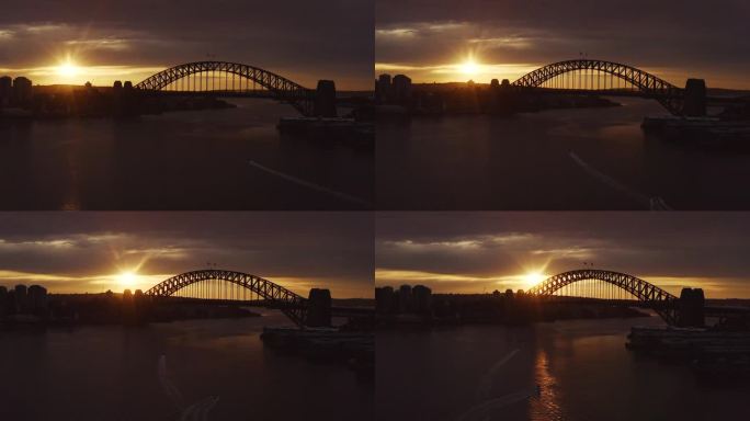 金色的冬日日出，悉尼海港大桥的背光