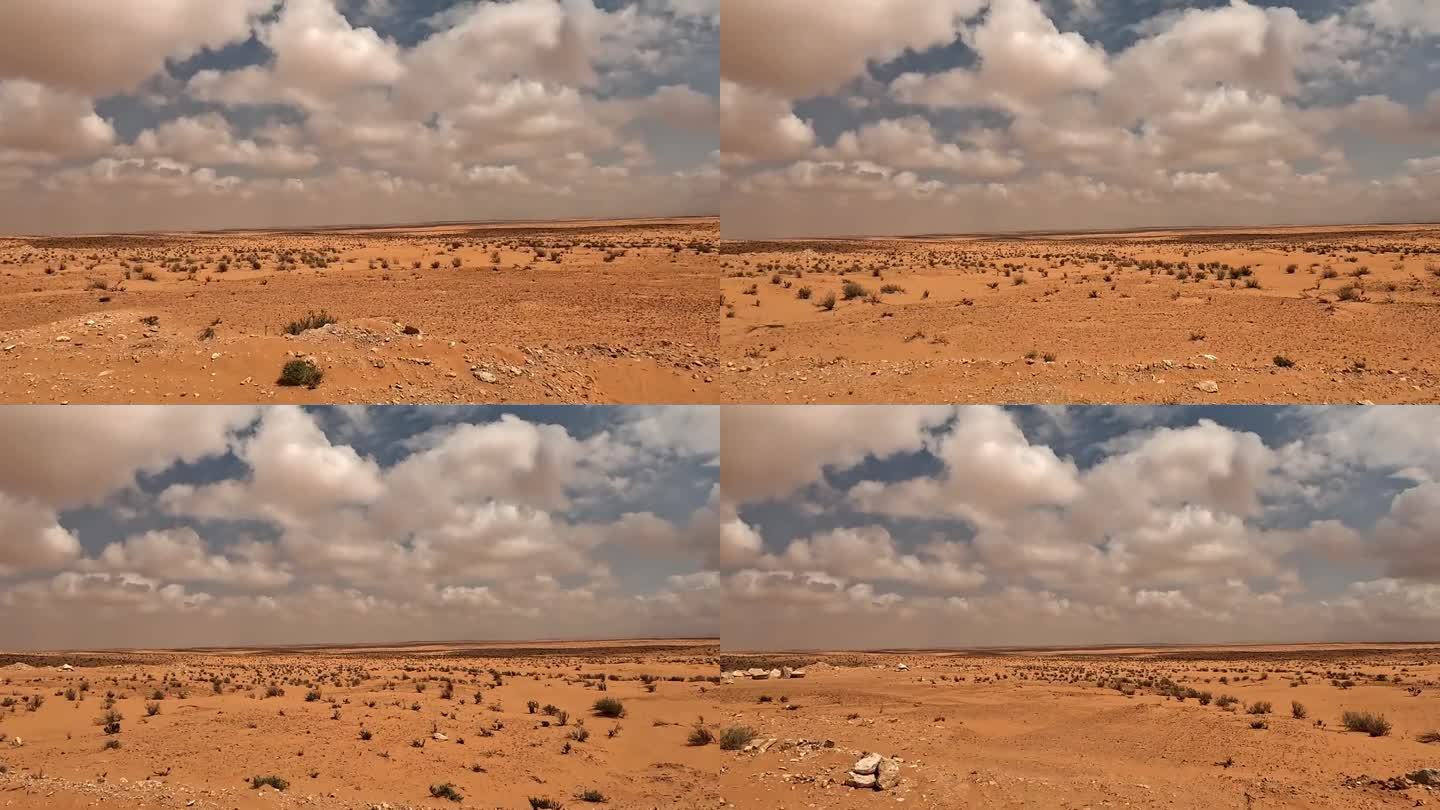驾车穿越突尼斯干旱的沙漠景观，进行撒哈拉沙漠之旅，乘客视角
