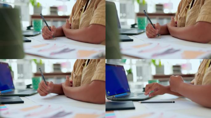 女士，在办公室用绿屏笔记本电脑写生、绘图或时装设计。女设计师的手在电脑上用模型显示和跟踪标记启动