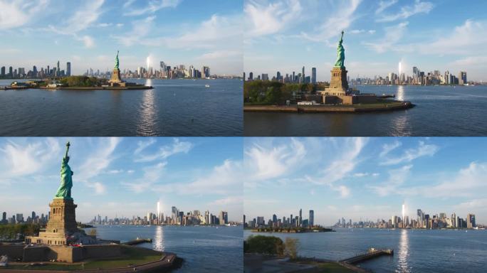 空中超缩镜头经过自由女神像与曼哈顿下城天际线与华尔街办公建筑的城市景观。移动的延时纽约摩天大楼和泽西
