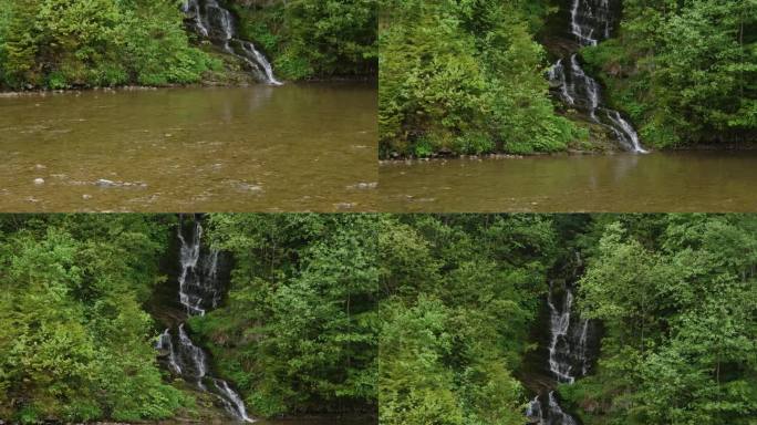 山间森林中的瀑布，小溪汇入河流