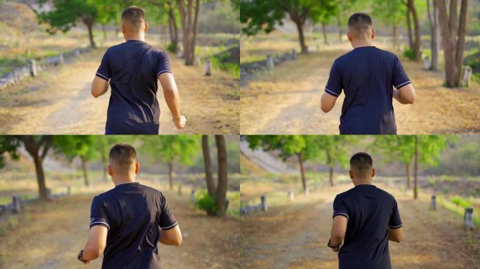 运动人男孩在日落时分独自跑在山附近进行运动训练。
