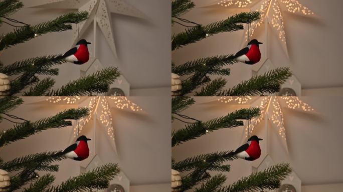 圣诞树上装饰着环保玩具，如红腹灰雀、圆锥体和纸星