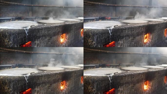豆浆是由豆浆在大锅里加热炖制而成的
