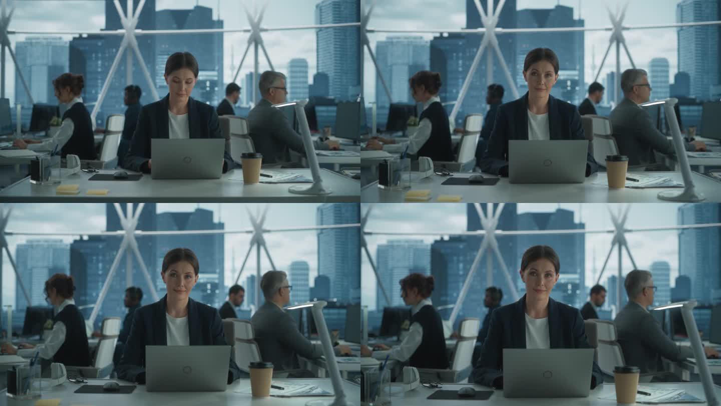 裁员、裁员和压力概念:市中心摩天大楼办公室里用笔记本电脑工作的女性项目经理。女商人看着镜头。戏剧性蓝