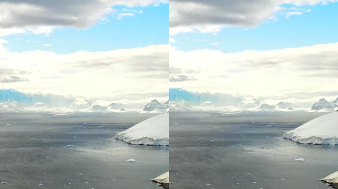 垂直视频雪，水，冰，冰山在南极的南极海洋。